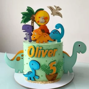 Arquivo digital de topo de bolo Dinossauro no formato Studio, ideal para festas infantis com tema de dinossauros e aventuras pré-históricas.